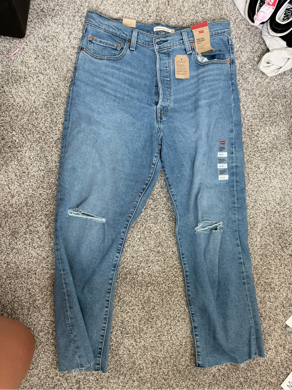 Levi's Women's Light Blue Straight Leg Jeans with Knee Rips
